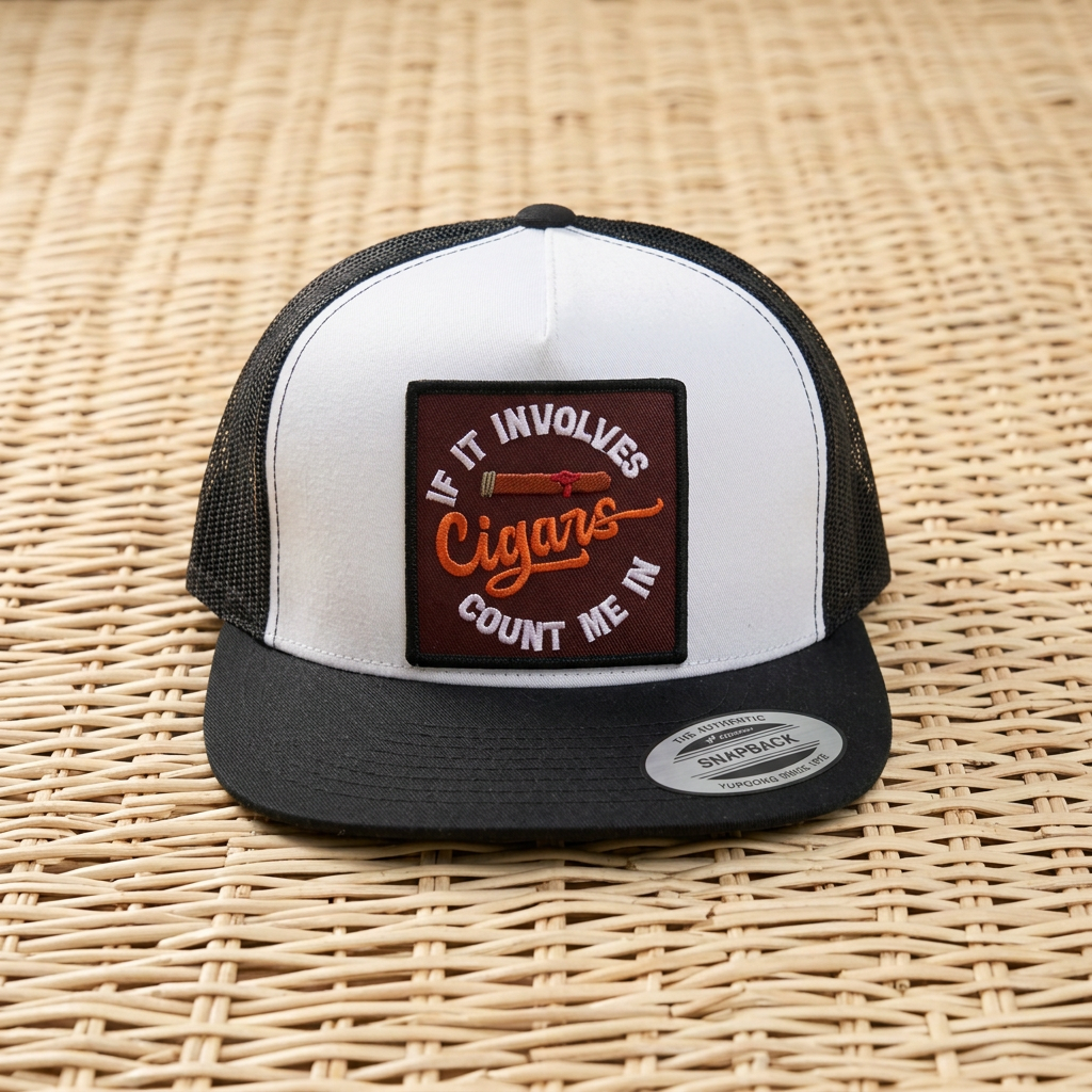 Count Me In cigar-patch hat on a clean woven background